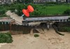 广东信宜一座在建桥梁暴雨中垮塌，镇政府：未造成人员伤亡